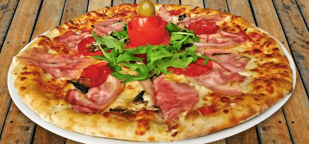 1 pizza podle výběru 